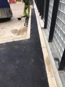 Find Footpath Repairs in Canary Wharf
